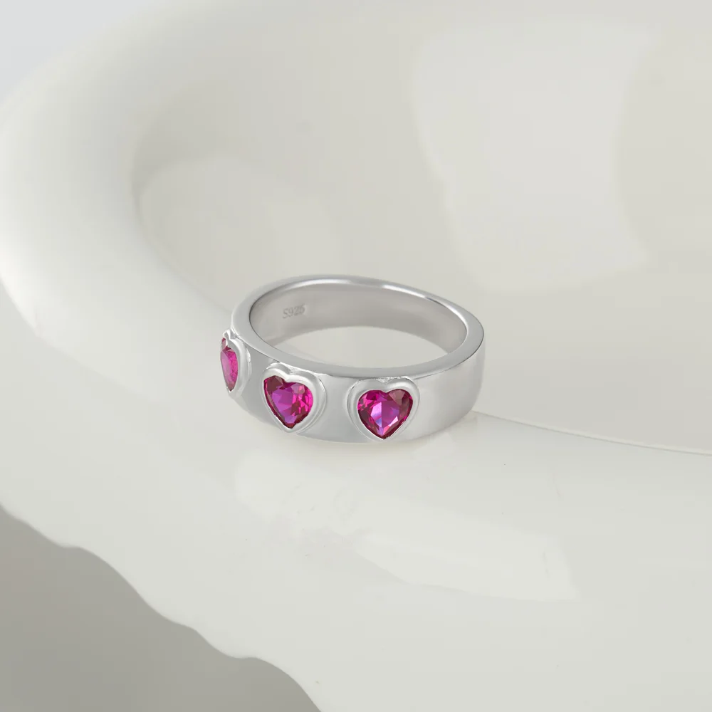 Three Heart Cut Ruby Red Sterling Silver Bezel Promise Ring