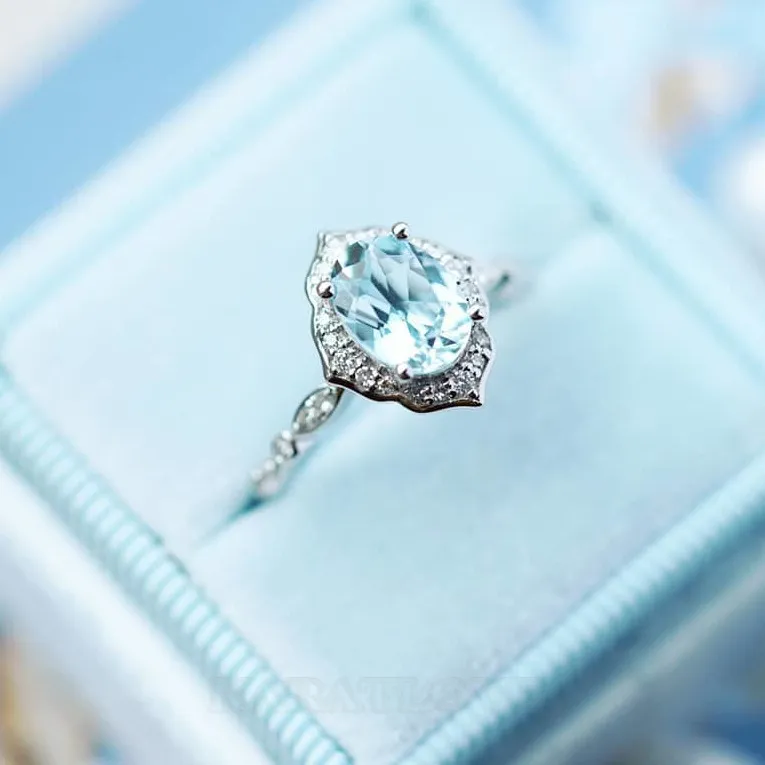 Oval Cut Aquamarine Sterling Silver Halo Engagement Ring