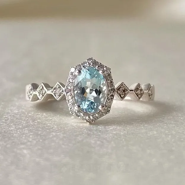 Oval Cut Aquamarine Sterling Silver Halo Engagement Ring