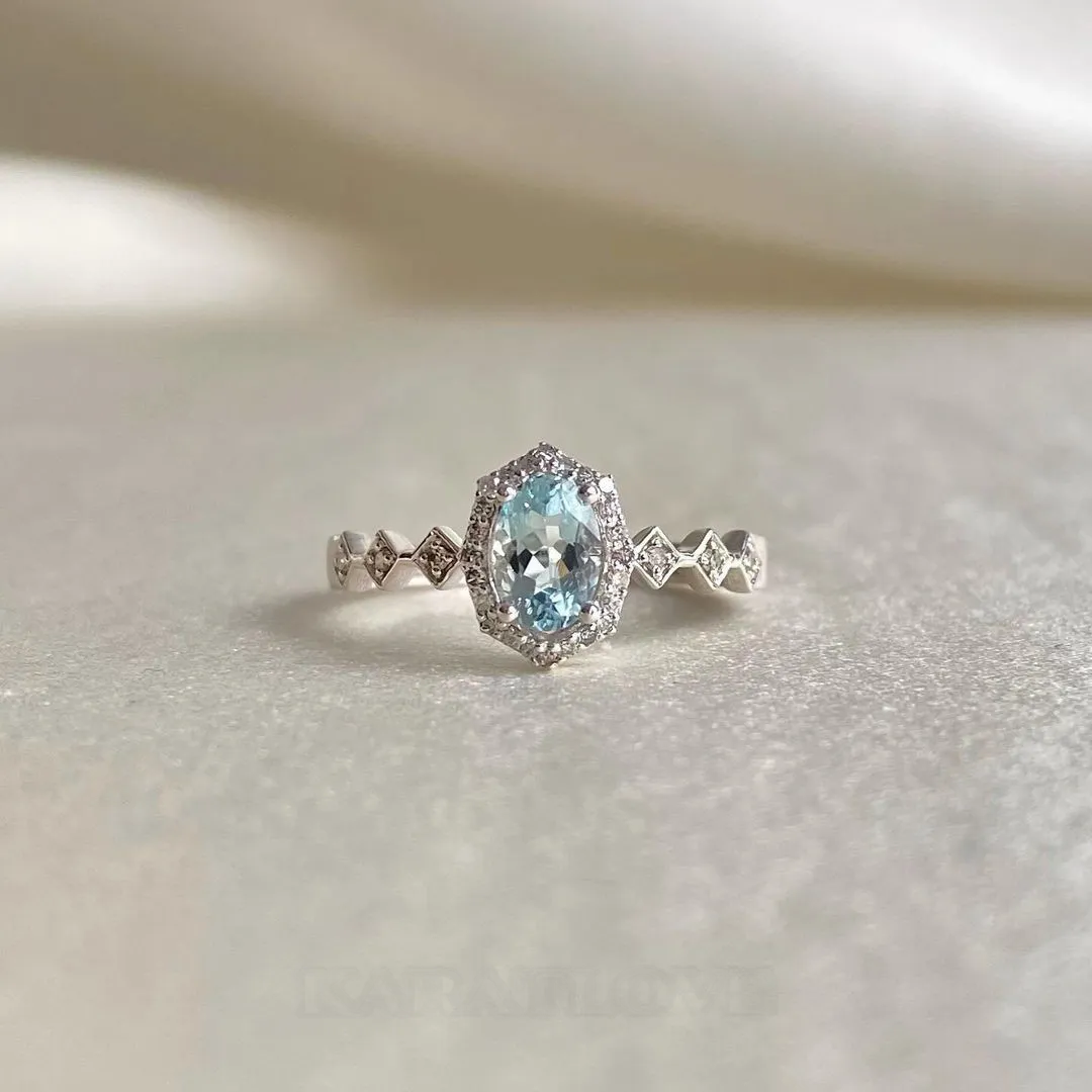 Oval Cut Aquamarine Sterling Silver Halo Engagement Ring