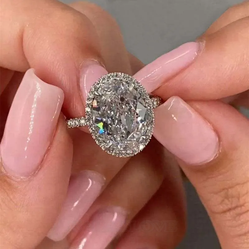 Oval Cut Diamond White Sterling Silver Halo Engagement Ring