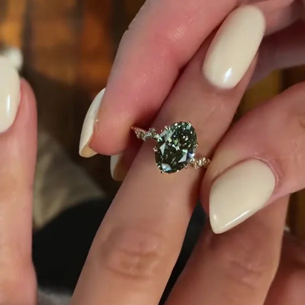 Oval Cut Peridot Green Sterling Silver Yellow Gold Engagement Ring