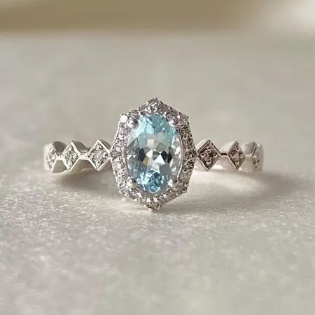 Oval Cut Aquamarine Sterling Silver Halo Engagement Ring