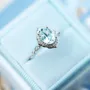 Oval Cut Aquamarine Sterling Silver Halo Engagement Ring