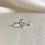 Oval Cut Aquamarine Sterling Silver Halo Engagement Ring