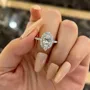 Oval Cut Diamond White Sterling Silver Halo Engagement Ring