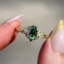 Pear Cut Emerald Green Sterling Silver Yellow Gold 3-Stone Engagement Ring