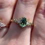 Pear Cut Emerald Green Sterling Silver Yellow Gold 3-Stone Engagement Ring